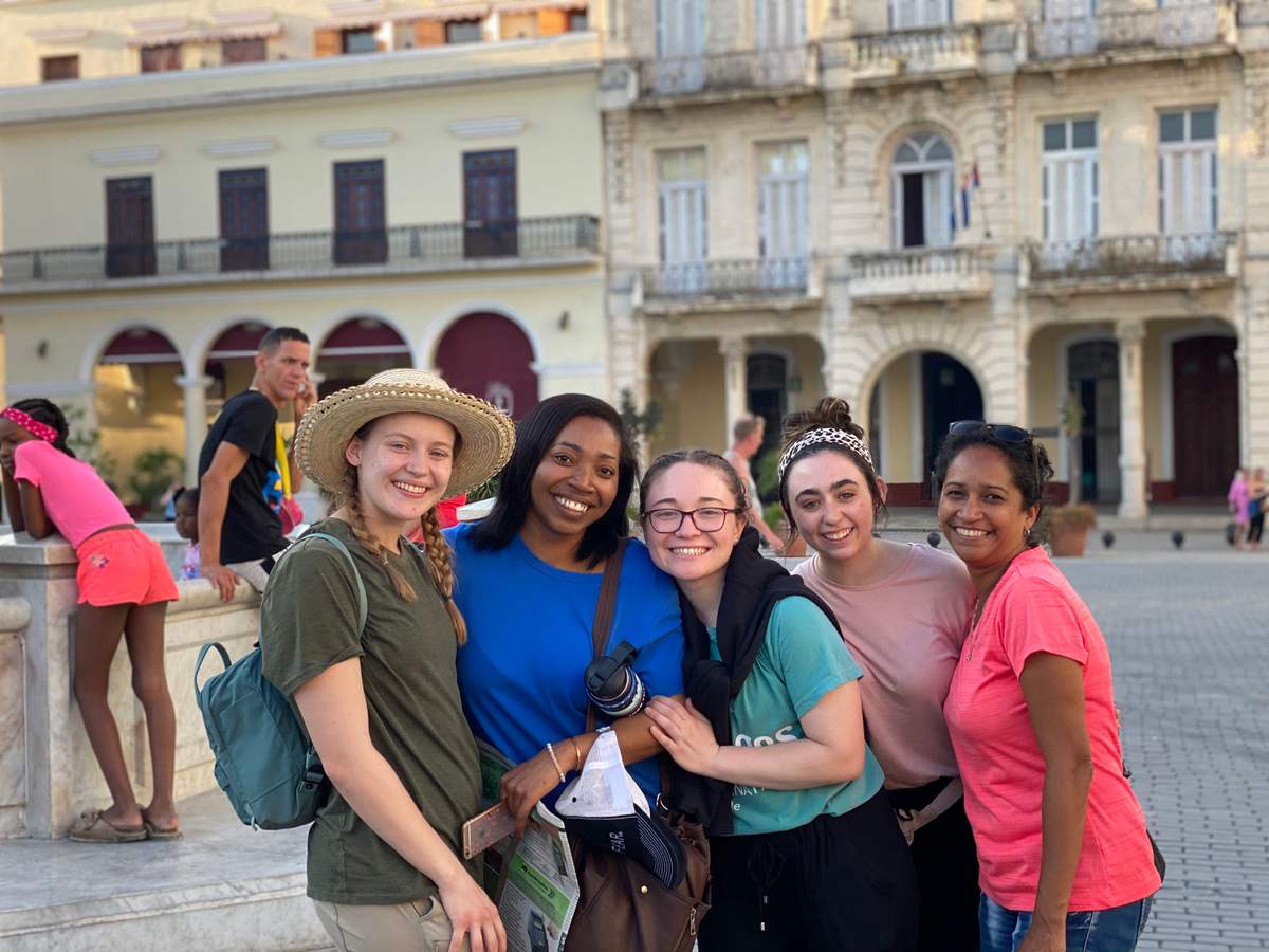 A smiling mission team on a street in Havana, Cuba