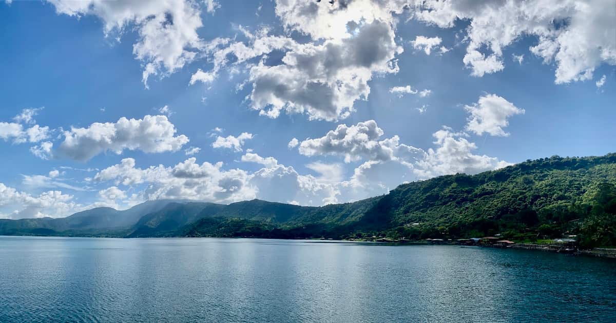 Coatepeque Crater Lake under a cloudy sky in El Salvador