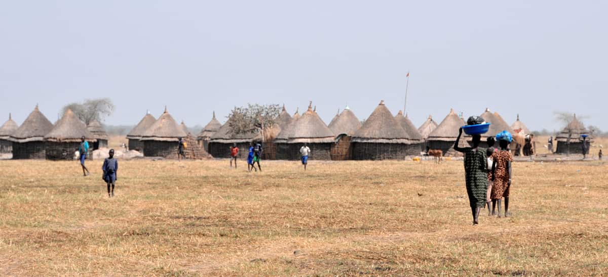 Thatched huts on a dry plain in South Sudan