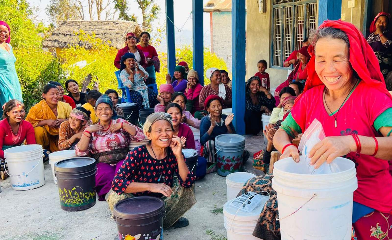 Women in Nepal gather at a filter distribution
