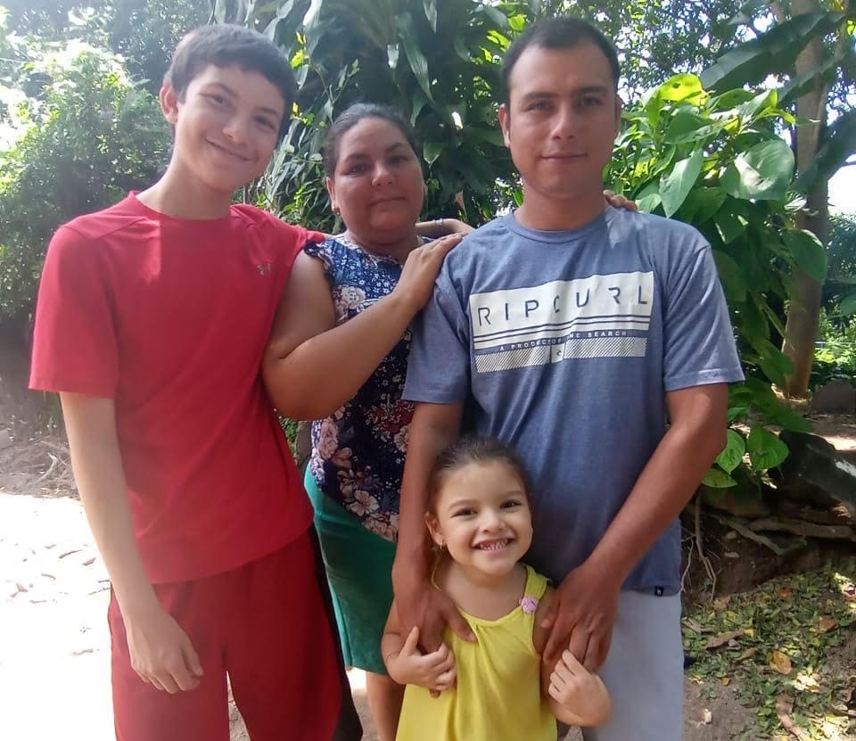 Carmen, pictured with her husband and two children.