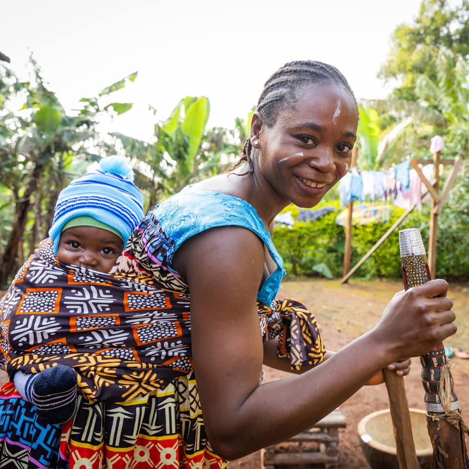 Woman with baby in tow